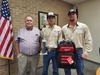 Cherokee County Judge Chris Davis (left) drops by to congratulate CCECA apprentice lineman Corban Renfroe (center). With them is Kody Stanley (left), who trained the four-man CCECA team who competed in the lineman's rodeo

Jo Anne Embleton/Cherokeean Herald