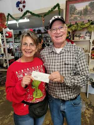 Rusk Cares – Good Samaritan board president Mona Burford accepts a $700 check from Vic Whadford of the Rusk Lions Club for the Good Samaritan food pantry, which serves families from within Rusk ISD. 

Courtesy photo
