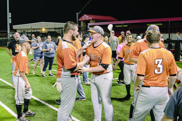 Photo by nathan johnson - natejohnsonphoto.com


Wells seniors Jackson Scroggins and Dillon Manning (center) and the rest of the Wells Pirates baseball team, along with fans, celebrate their win over LaPoynor last week. The Pirates are now advancing to the State baseball playoffs in Roundrock. PPND - Pirate pride never dies!