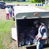 Photo by Cristin Parker
Cherokee County Community  Supervision and Corrections Department staff and clients unload a trailer load of donated food items at the Good Samaritan in Rusk last week.