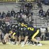 The Yellowjacket offensive line prepares to execute a play during Thursday night’s game against Ore City. 

Photo by Beverly Milner