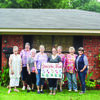 The Rusk Area Garden Club has chosen the yard of Josh and Briana Gentry at 115 Short Street as its June Yard of The Month. Pictured are Linn Landis, Martha Neeley, Judy Waugh, Elizabeth Holcomb, Briana Gentry, Sissy Crysup, Maxine Pierce and Jane Parsons.