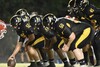 Yellowjacket players create a line of defense against their Groveton competitors

Photo by Merry Lamar