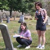 TJC students Kyla Illingsworth (left) and Sarah Perry record names from a headstone before snapping a quick photo. 

Cherokeean Herald photo