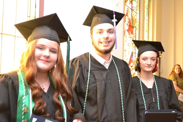 Shelby Gray (left), Nehmemiah Aaron Fox and Lilyana Canty share a smile following their graduation from Piney Woods Co-op on May 20, 2023

Cherokeean Herald photo.