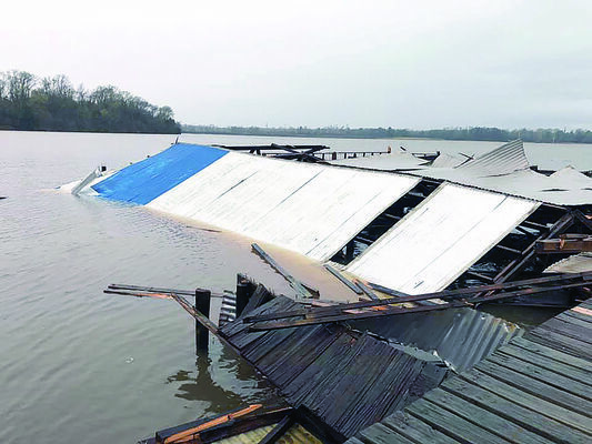 The aftermath of last week’s severe weather left the public fishing pier at Lake Striker Resort &amp; Marina destroyed.
