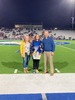 With her proud parents at her side, JHS senior Ava Morris is recognized during Senior Night ceremonies held before game kick-off. Courtesy photo